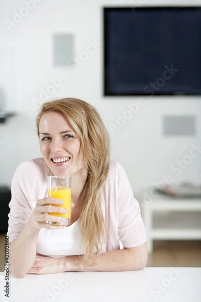 Obraz Young woman sat at table