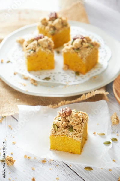 Fototapeta Pumpkin Cube pound cake set on cafe table.
