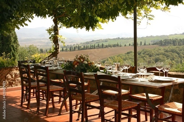 Fototapeta Table set for al fresco dinner with a view. Tuscany, Italy 