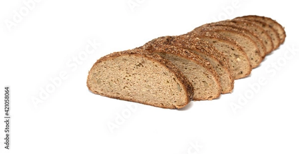 Fototapeta sliced rye bread loaf on a white plate