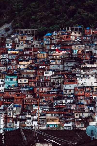 Fototapeta Close-up on favela in Rio, Brazil. Many tiny houses squeezed in the mountain