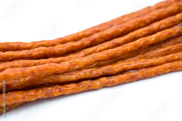Obraz Typical Polish sausage kabanos isolated on white background