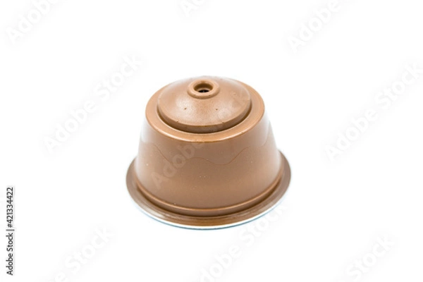 Fototapeta Coffee capsule for coffee machine isolated on white background