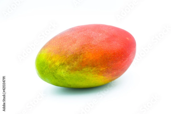 Obraz Whole mango fruit isolated on a white background. Fropical addition to slimming diets and a great natural snack.