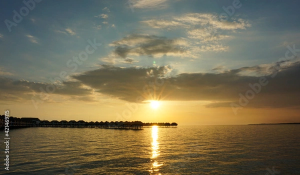 Obraz Beautiful cloudy sunset in Bagan Lalang beach, Selangor, Malaysia.
