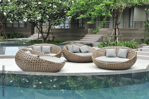 Obraz outdoor furniture rattan chairs and table on terrace.
