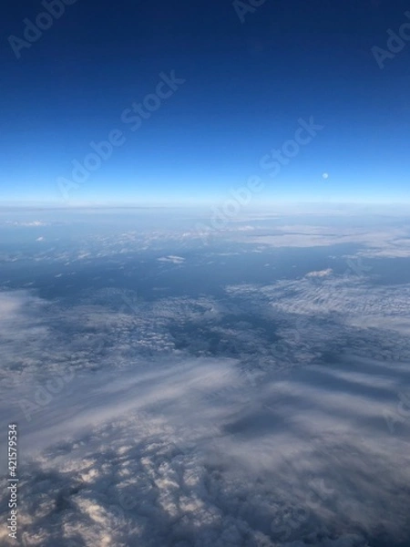 Obraz view from the plane window clouds and moon day