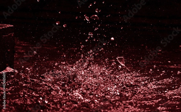 Fototapeta Exploding red water drops