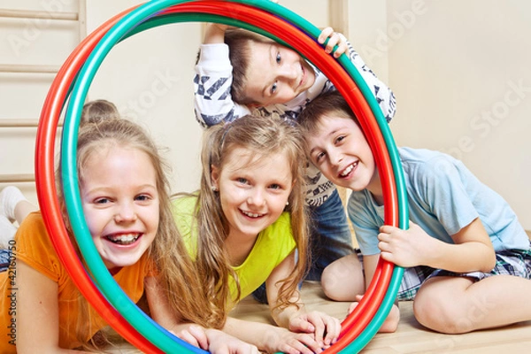 Obraz Children with  hula hoops