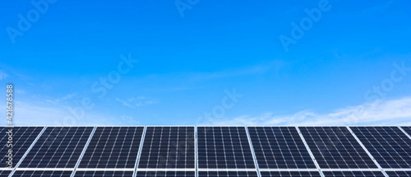 Fototapeta Solar cell panels power plant with clouds over blue sky, sunlight supply collector system for clean and green sustainable energy..Photovoltaic power generation, alternative distribute electricity.