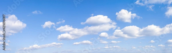 Obraz Panorama or panoramic photo of blue sky and white clouds or cloudscape.