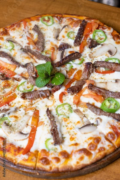 Obraz close-up mixed pizza with meat