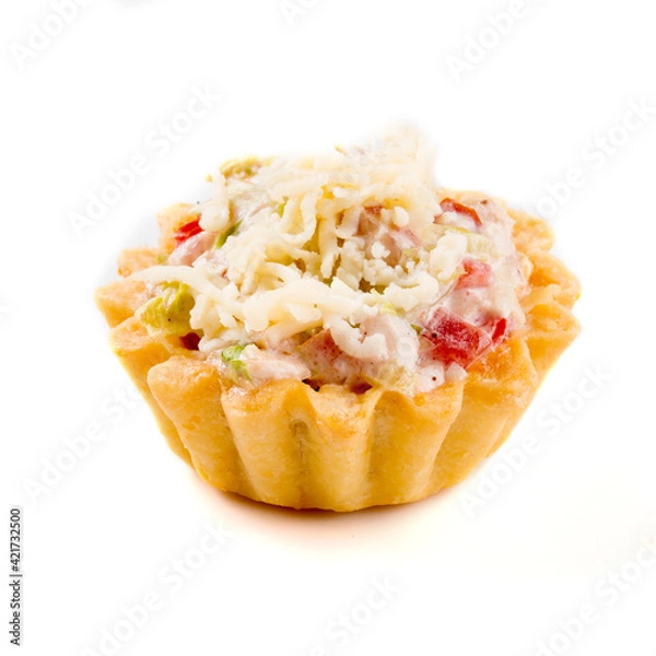 Fototapeta Isolated salty appetizer tartlet on the white background