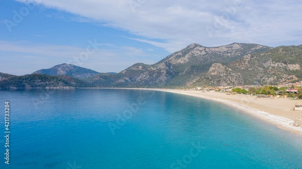 Fototapeta A fascinating view that has the unique nature of Oludeniz which is a county of Fethiye in Turkey. Because of its warm climate and fresh air, it has been an important destination to visit for tourists.