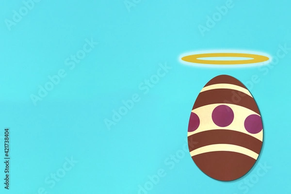 Obraz Easter egg with halo on light blue background. Colorful. Paper texture. Illustration.