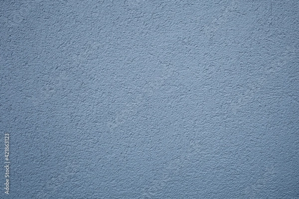 Obraz A simple texture of blue-gray background in the form of a rough grainy coating with putty or plaster on a flat surface