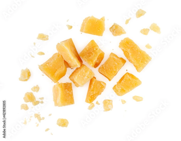 Fototapeta Heap of hard cheese parmesan isolated on a white background. Close up. Top view.