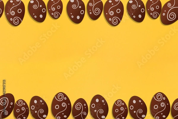 Obraz Painted easter eggs on yellow background. Colorful. Paper texture. Illustration.