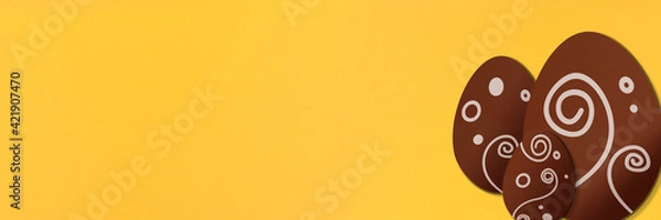 Obraz Painted easter eggs on yellow background. Colorful. Paper texture. Illustration. Banner.