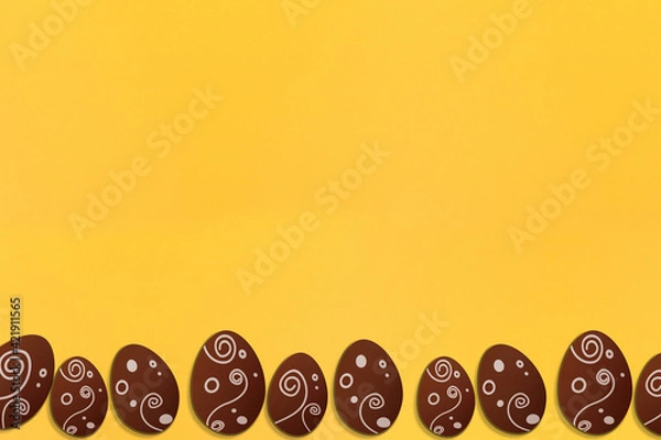 Obraz Painted easter eggs on yellow background. Colorful. Paper texture. Illustration.