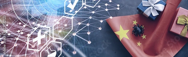 Fototapeta The concept of the world coronavirus pandemic. The geographical location of the virus. China flag and virus model and gift box.