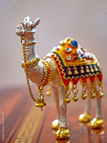 Obraz Beautiful souvenir camel figurine standing on the table