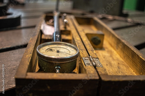 Obraz antique clock on a table