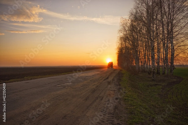 Obraz sunset over the road