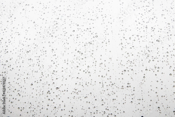 Fototapeta Water Drops Background. Macro view of icy rain drops on the window creating abstract geometric graphic shapes. Close Up