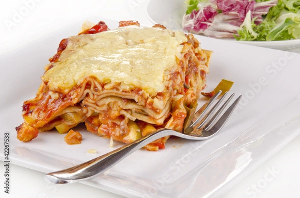 Fototapeta vegetable lasagna with a fork