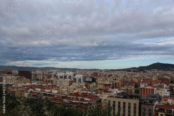 Obraz Ciudad y nubes. 