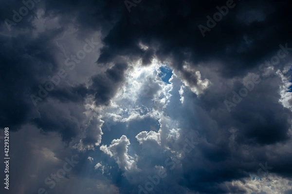 Obraz Cumulus clouds in a blue sky.