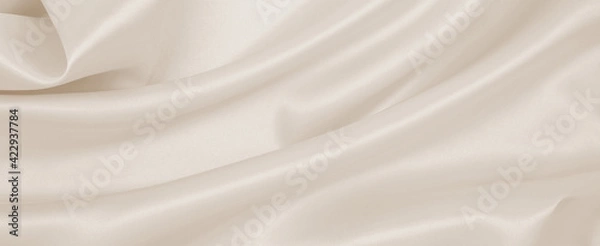 Fototapeta Smooth elegant golden silk or satin luxury cloth texture as wedding background. Luxurious background design. In Sepia toned. Retro style