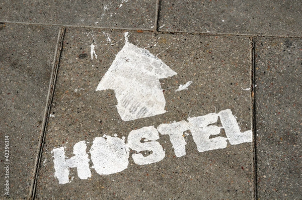 Fototapeta hostel sign on the ground