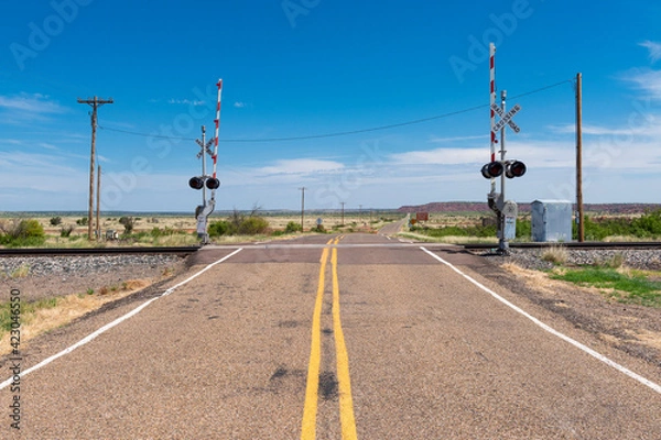 Fototapeta A railroad crossing in a rural area of the State of New Mexico, USA.,