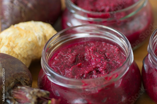 Fototapeta Bowl of homemade Red Chrain, a spicy paste made of grated Horseradish (Armoracia rusticana, syn. Cochlearia armoracia) and Beetroot, a traditional food of the Jewish Passover holiday