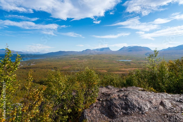 Fototapeta Lapponian gate, famous mountain pass in the Swedish arctic in beautiful autumn colors on a sunny day. Viewed from Nuolja, Njulla mountain. Hiking in Abisko national park, Kiruna, Sweden.