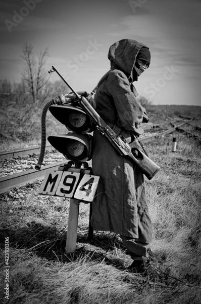 Obraz person with a gun