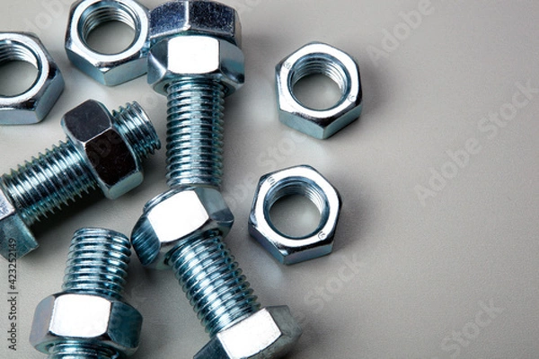 Obraz nuts screws fastening materials closeup