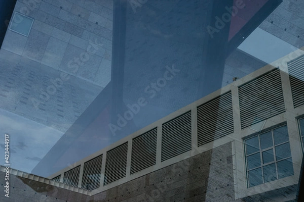 Fototapeta multi expositionof a modern building with windows and reflexion