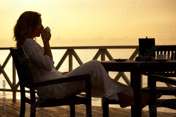 Obraz drinking tea at sunset