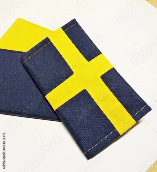 Fototapeta Swedish flag in Sweden Passport cover travelling