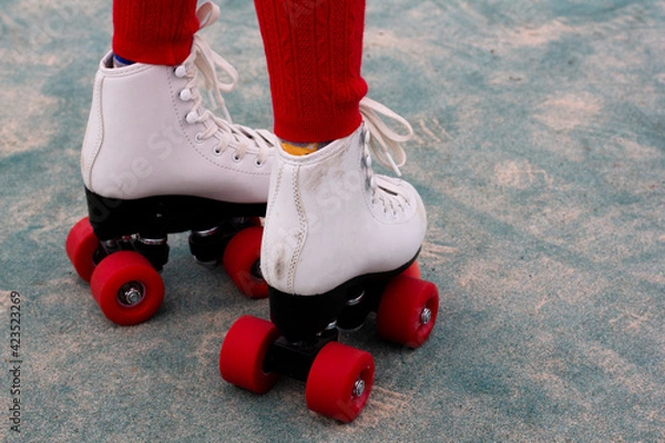 Obraz A child's red wheels roller skate