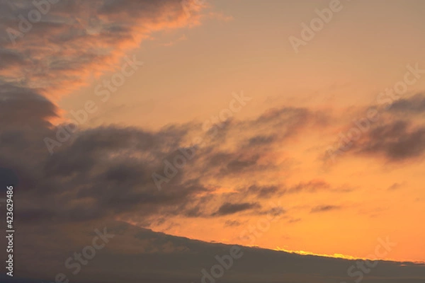 Fototapeta sunset in the clouds