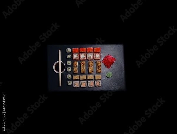 Fototapeta SUSHI ROLLS  and classic sushi and soups with some sweets, menu for sushi bar