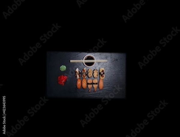 Fototapeta SUSHI ROLLS  and classic sushi and soups with some sweets, menu for sushi bar