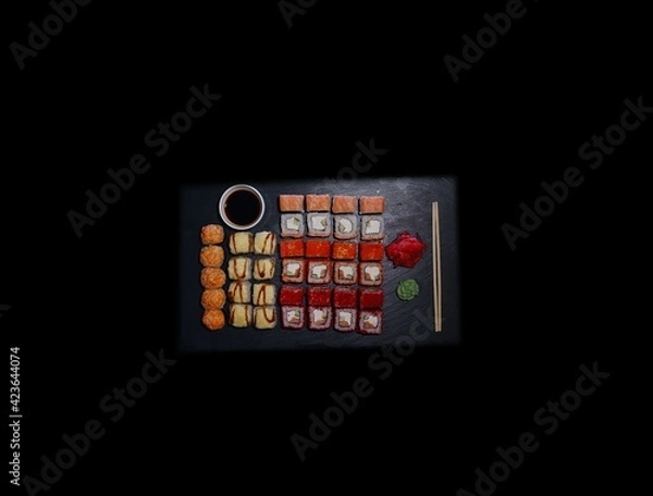 Fototapeta SUSHI ROLLS  and classic sushi and soups with some sweets, menu for sushi bar
