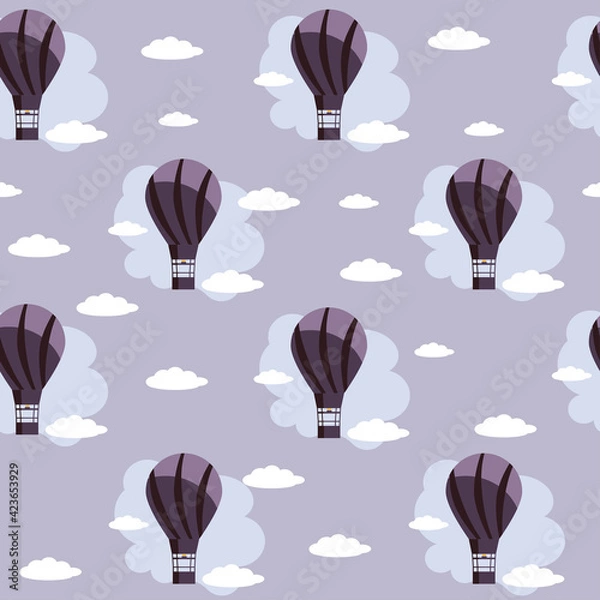 Fototapeta a seamless pattern featuring balloons and clouds in the sky. vector background for print, textile. air balloon flying in the sky