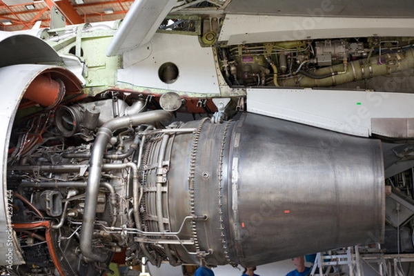 Fototapeta opened aircraft engine in the hangar