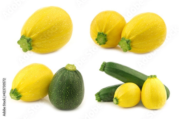 Fototapeta yellow and green zucchini's (Cucurbita pepo) on a white background